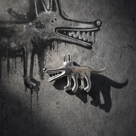 BABAR: Sterling silver brooch, a unique creation designed by artist Dr. Ponce for the "Les Chiens de la Casse" collection.