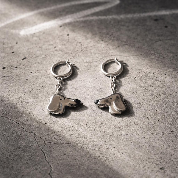 VINI ET VITO: Sterling silver earrings, a unique creation designed by artist Dr. Ponce for the 'Les Chiens de la Casse' collection.