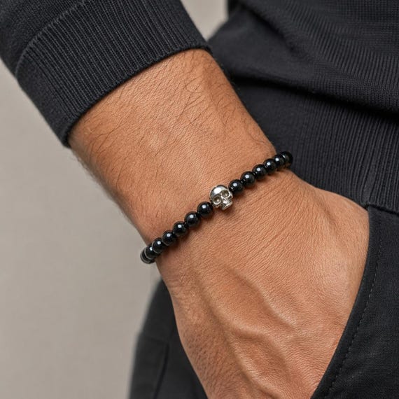 LE SANG De MARS – Hematite Bracelet with Sterling Silver Skull – Memento Mori Amulet