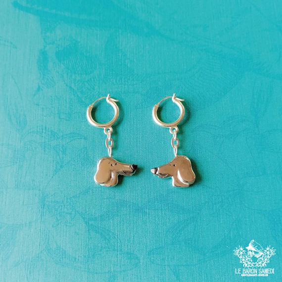 VINI ET VITO: Sterling silver earrings, a unique creation designed by artist Dr. Ponce for the 'Les Chiens de la Casse' collection.