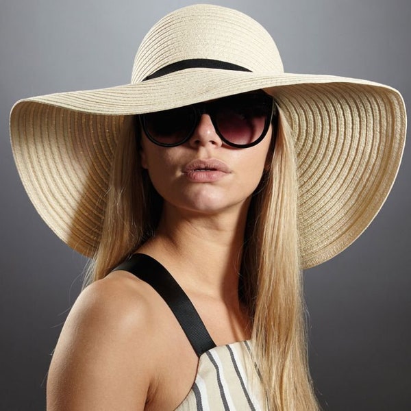 Elegante sombrero para el sol. Sombrero de copa. Sombrero de verano. Sombrero de sol de ala ancha. Sombrero de paja para el sol. Sombrero de sol de playa.