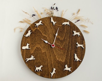 Wood clock with different dog poses Figures of dogs of different breeds in motion