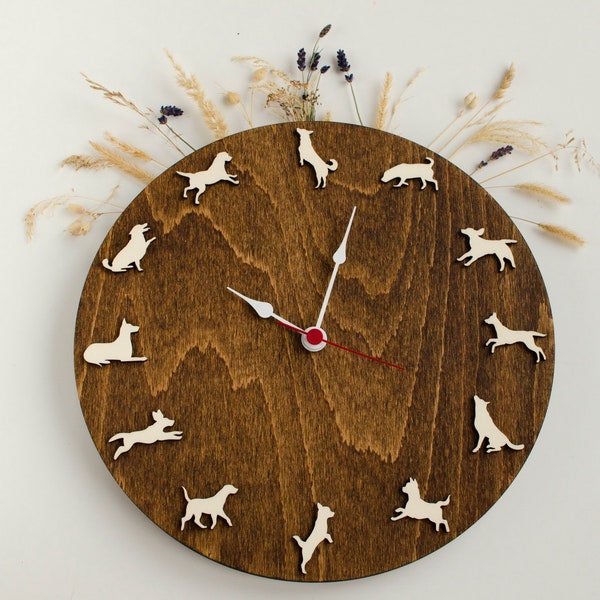 Wood clock with different dog poses Figures of dogs of different breeds in motion
