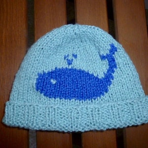 Hand knit organic cotton baby hat, whale baby hat,  deep blue whale swims in light aqua blue water - newborn - 3 months size