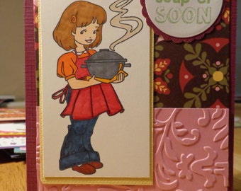 Girl holding soup tureen card