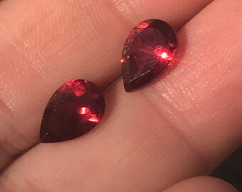 Garnet Pair 3 cts cts total~Untreated with a color shift wine red/ purple~ Perfect for the jeweler or Collector, watch video, stones in Sun!