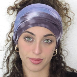 May include: A purple and blue tie dye headband.