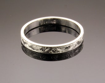 Hand engraved silver wedding band