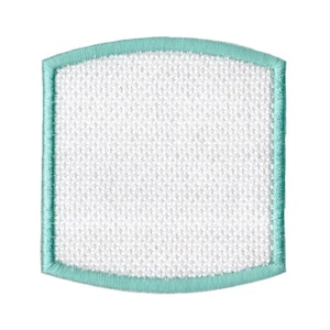 May include: A white fabric patch with a light blue border. The patch is rectangular with rounded corners.