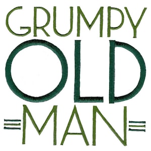 May include: White background with the words "GRUMPY OLD MAN" embroidered in green thread. The word "OLD" is in a dark green circle. The word "MAN" has three horizontal lines on each side.