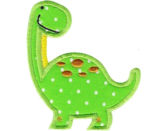 May include: Green dinosaur applique with white polka dots and orange spots. The dinosaur has a smiling face and a long neck.