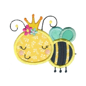 May include: A yellow and black bee with a crown and flowers on its head. The bee is smiling and has closed eyes. The bee is next to a smaller bee with black and yellow stripes and green wings.