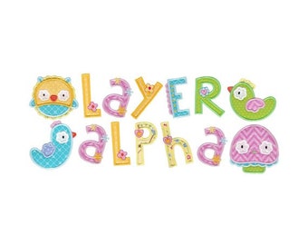 May include: A set of colorful felt letters spelling "Layer Alpha" with cute animal and floral embellishments. The letters are yellow, blue, green, and pink.