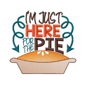May include: Embroidered design with the text "I'm just here for the pie" in brown, orange, and teal. A brown pie crust with a golden filling is below the text.