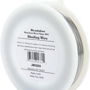 May include: A spool of Beadalon stainless steel binding wire, type 304. The label reads "Binding Wire 020" T304 8OZ. Made in USA. Valley Twp., 19320.