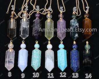 May include: Fourteen gold chain necklaces with crystal bottle stoppers. The bottles are made of clear quartz, amethyst, green aventurine, citrine, clear quartz, blue lace agate, tiger's eye, rose quartz, blue chalcedony, amazonite, clear quartz, turquoise, lapis lazuli, and fluorite.