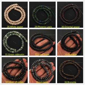 May include: A collection of gemstone bead strands, including white jasper, Phoenix Lapis, Oriental jasper, Green dalmatin, Lava Stone, Obsidian, Silver obsidian, Larvikite, and Bronzite. Each strand is a different color and texture, perfect for jewelry making.