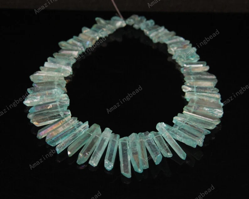 Approx 65pcs/Strand AB Blue Natural Quartz Crystals Points Pendant,Raw Top Drilled,Faceted,Graduated Beads