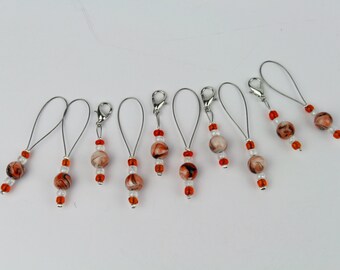 Set of 6 stitch markers and 4 progress markers