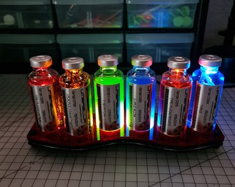 Xience Technologies Red Vial Lighted Display Rack.