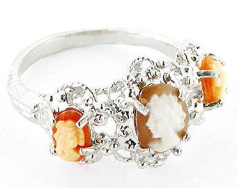 Anello con cammeo in conchiglia: filigrana in argento sterling, tre profili romani