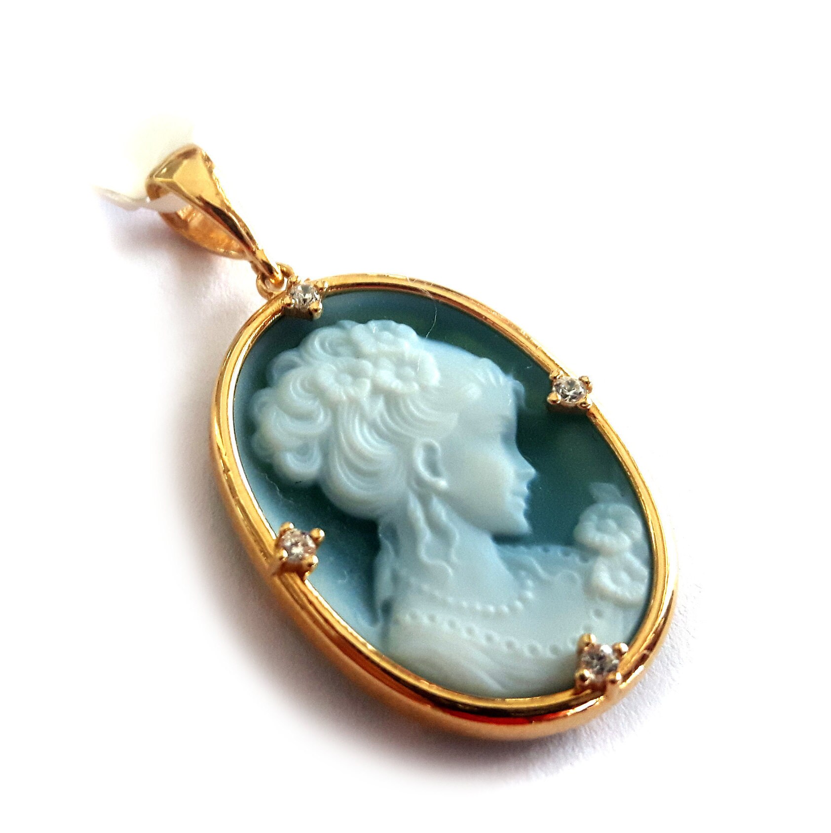 Pendant with woman's profile deals