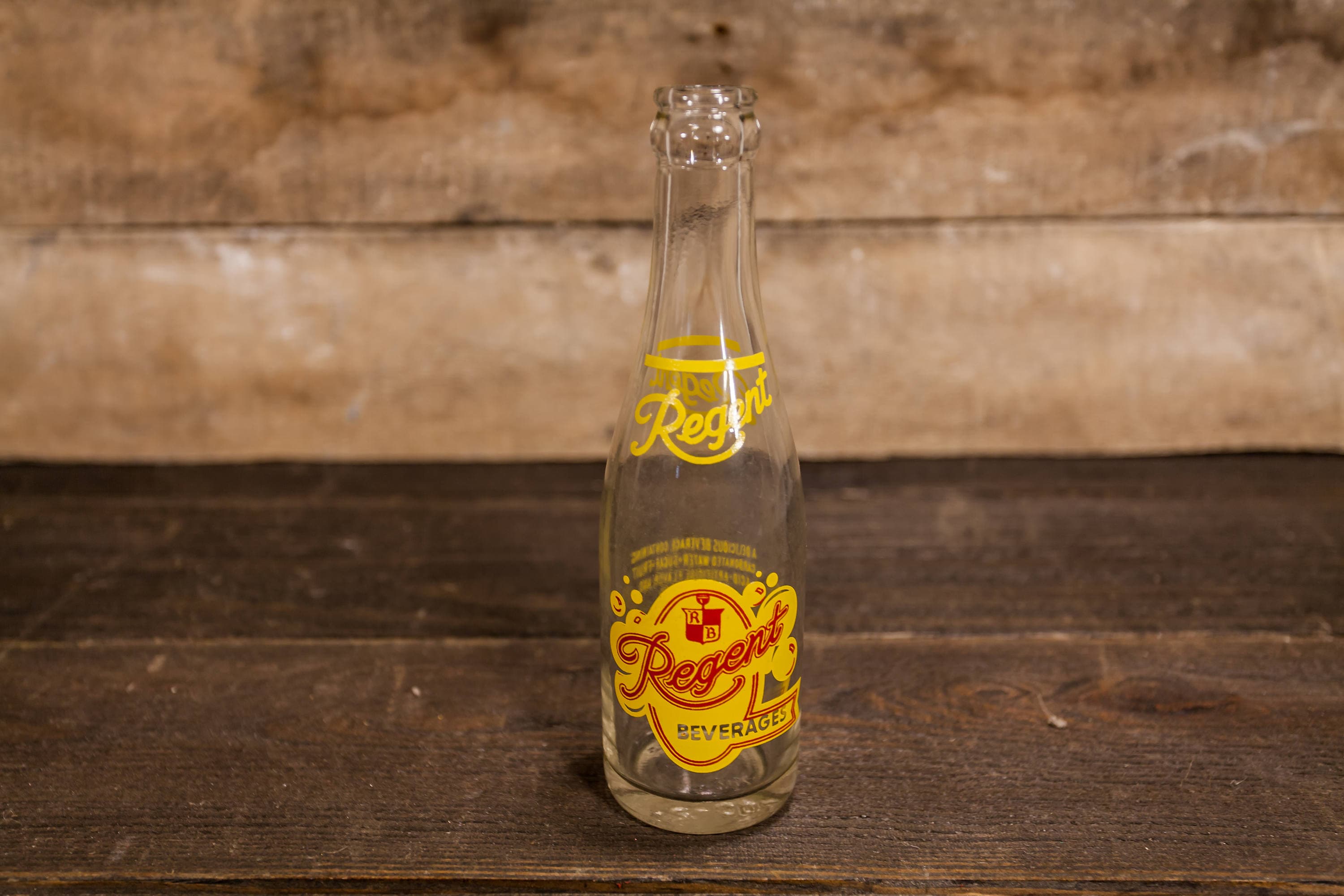 Vintage Regent Beverages 7oz Bottle ACL Glass Bottle Red Yellow Regent