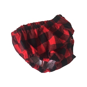May include: Red and black checked baby bloomers with a frilled elastic waistband.