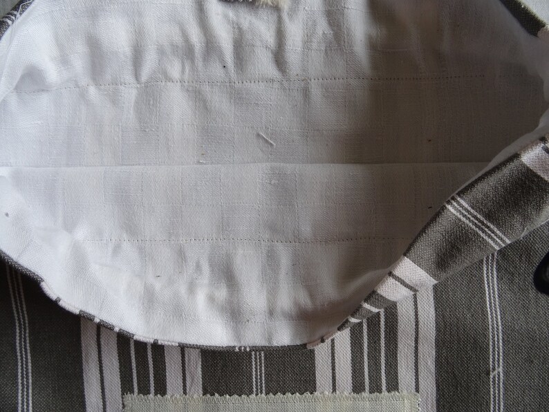 Full-lined vintage grey and white mattress canvas bread bag;