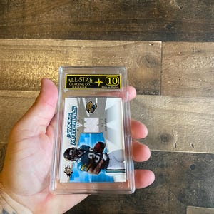 Maurice Drew Patch Rookie Card Vintage 2006 Graded 10 Mint SPX Winning Materials WMRMD Slab NFL Football Jacksonville Jaguars