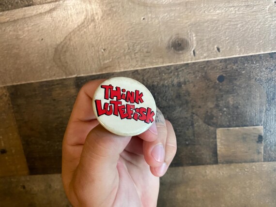 Think Lutefisk Pin Vintage Button Pinback Hat Cap Jacket Coat Fargo Rubber Stamp Works