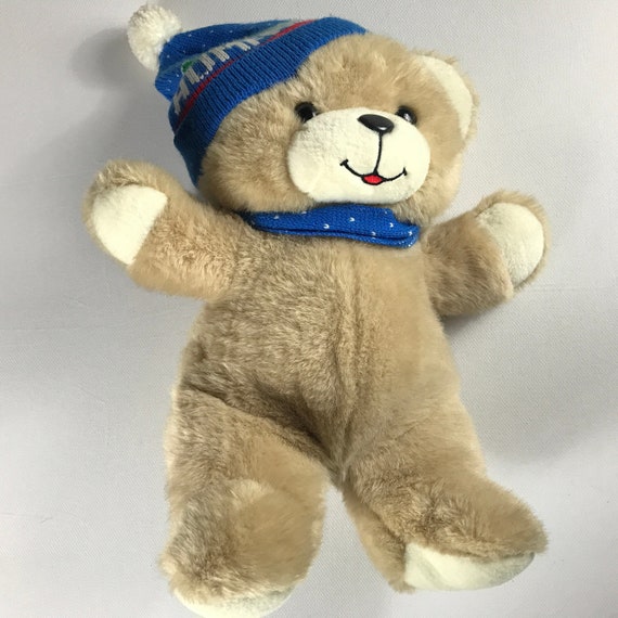 teddy bear with hat and scarf
