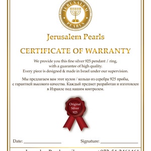 May include: Certificate of Warranty for a silver 925 pendant or ring. The certificate is from Jerusalem Pearls and states that the piece is designed and made in Israel under their supervision. The certificate includes a seal that says "Original Silver 925".