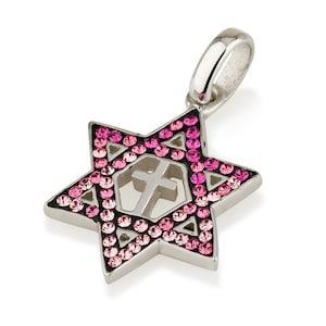 May include: A silver pendant in the shape of a Star of David with a cross inside. The pendant is decorated with pink crystals.