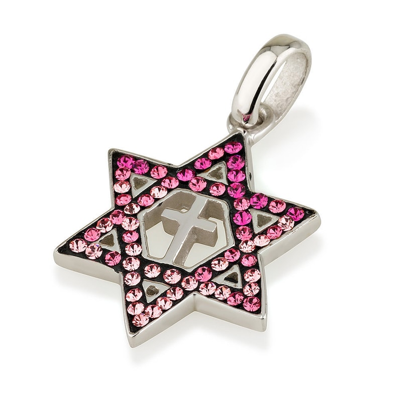 May include: A silver pendant in the shape of a Star of David with a cross inside. The pendant is decorated with pink crystals.