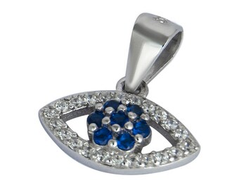 May include: Silver pendant with a blue eye charm surrounded by clear stones. The eye charm is a popular symbol of protection and good luck.