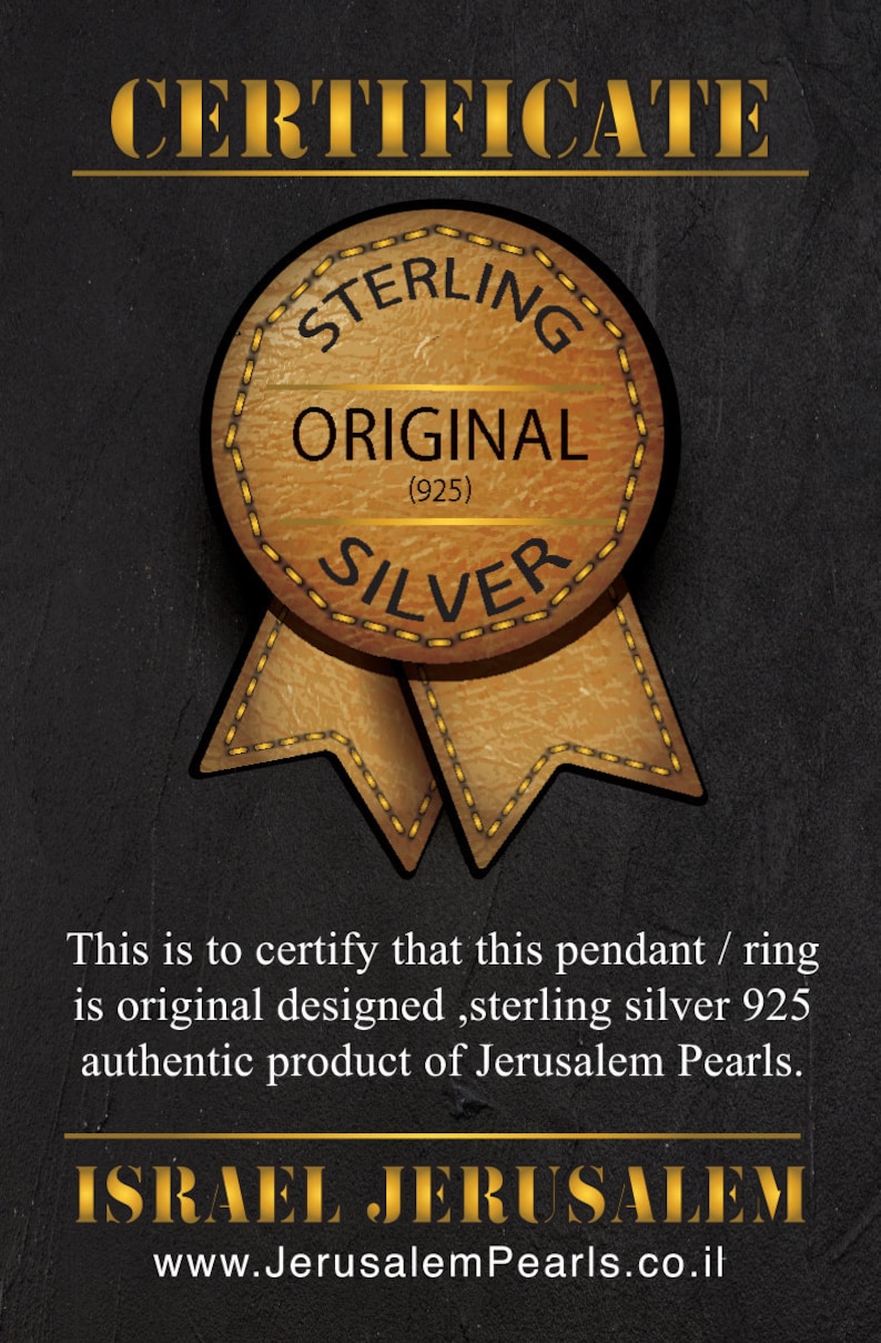 May include: Certificate of authenticity for a sterling silver pendant or ring. The certificate features a brown leather-like seal with the words "Sterling Original (925) Silver" and a gold ribbon. The text on the certificate reads "This is to certify that this pendant / ring is original designed, sterling silver 925 authentic product of Jerusalem Pearls. ISRAEL JERUSALEM www.JerusalemPearls.co.il"