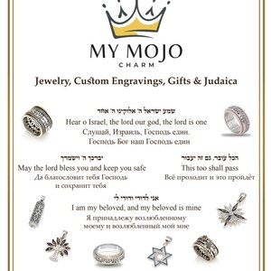 May include: A collection of silver jewelry with Hebrew text and symbols. The jewelry includes rings, pendants, and a charm bracelet. The text in the image reads "Hear o Israel, the lord our god, the lord is one" and "May the lord bless you and keep you safe".