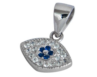 May include: Silver evil eye pendant with a blue flower in the center and clear crystals around the eye.