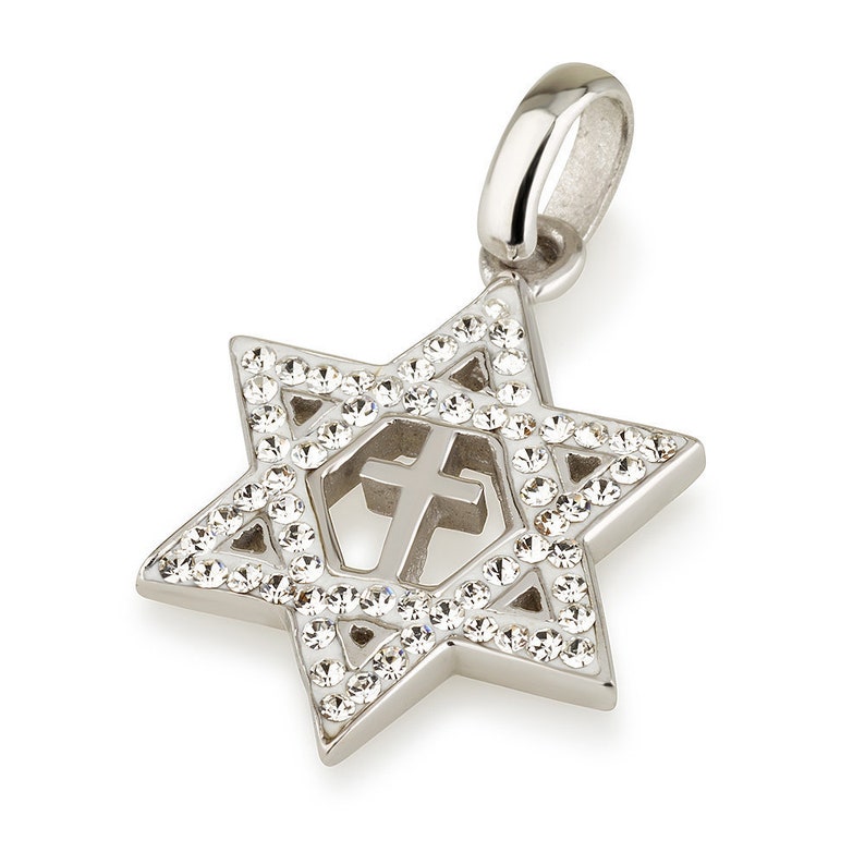 May include: A silver pendant in the shape of a Star of David with a cross inside. The pendant is decorated with clear crystals.