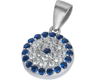 May include: Silver pendant with a blue and white evil eye design. The pendant is covered in small, clear crystals and has a blue circle around the center.