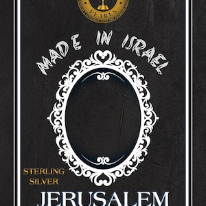 May include: A black and white image with a gold circle that says "Jerusalem Pearls Jewelry & Souvenirs from the Promised Land" with a menorah inside the circle. The text "Made in Israel" is written in a white cursive font. A white ornate frame surrounds a blank space. The text "Sterling Silver" is written in white. The text "Jerusalem" is written in blue. The text "ישראל - ירושלים" is written in blue.