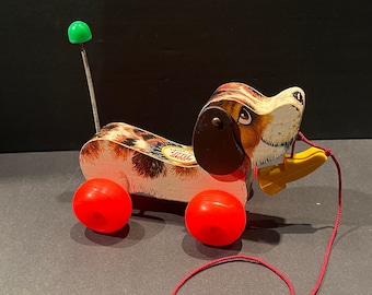 Fisher price snoopy dog pull toy 1961 online