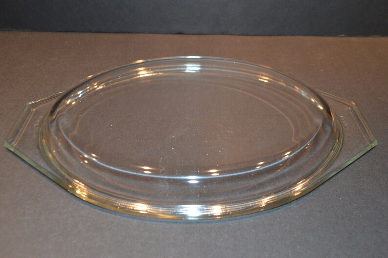 Vintage Turquoise Blue Snowflake 1.5 Quart Divided Pyrex Casserole Dish.