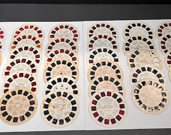 34 Random Damaged View Master Reels-All have some type of staining, missing film, or damage.