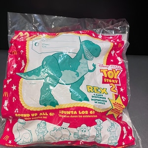 Disney&#39;s Toy Story 2 McDonald&#39;s Happy Meal Toy-Rex Candy Dispenser-Sealed-New Old Stock
