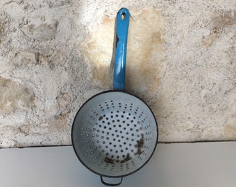 Vintage enamel colander, a small blue and white sieve