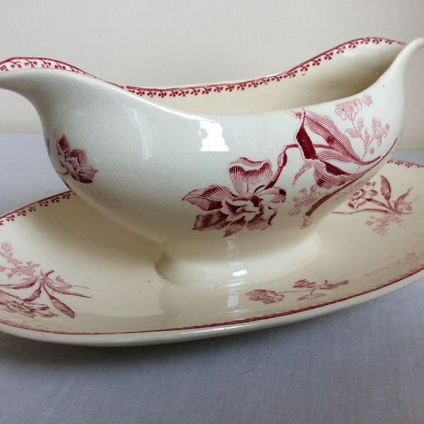 Antique gravy or sauce boat with red floral pattern by Sarreguemines from early 1900s, a stunning French serving dish