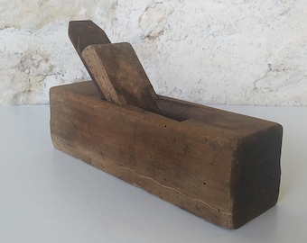 Antique French wooden plane, a rustic woodworking tool