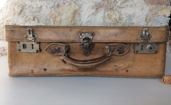 French leather suitcase, a vintage brown suitcase